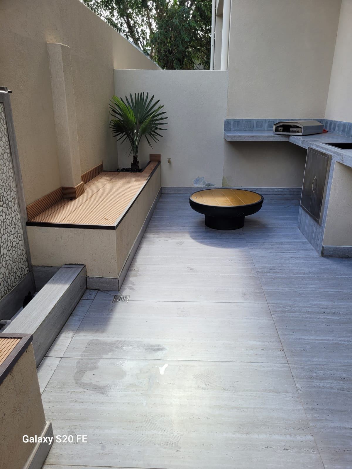 Outdoor kitchen and lounge area